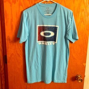 Light blue Oakley t-shirt from Buckle.